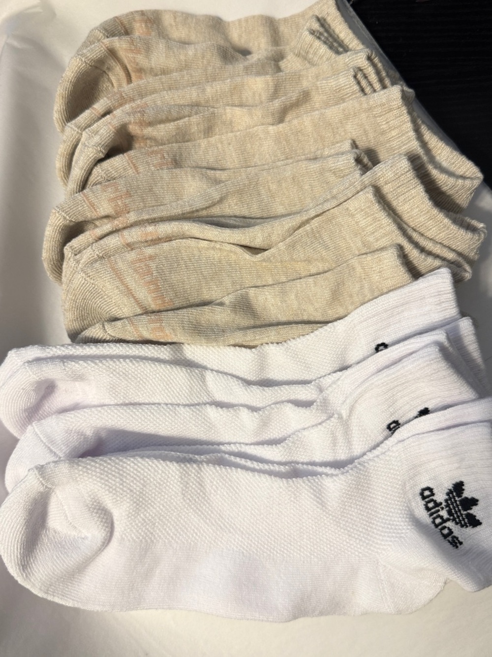 9 pairs of socks 6 timberland and 3 Adidas med-large